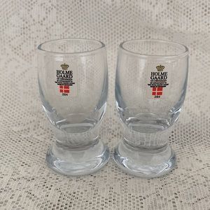 A pair of vintage Holmegaard 284 shot glasses made in Denmark.